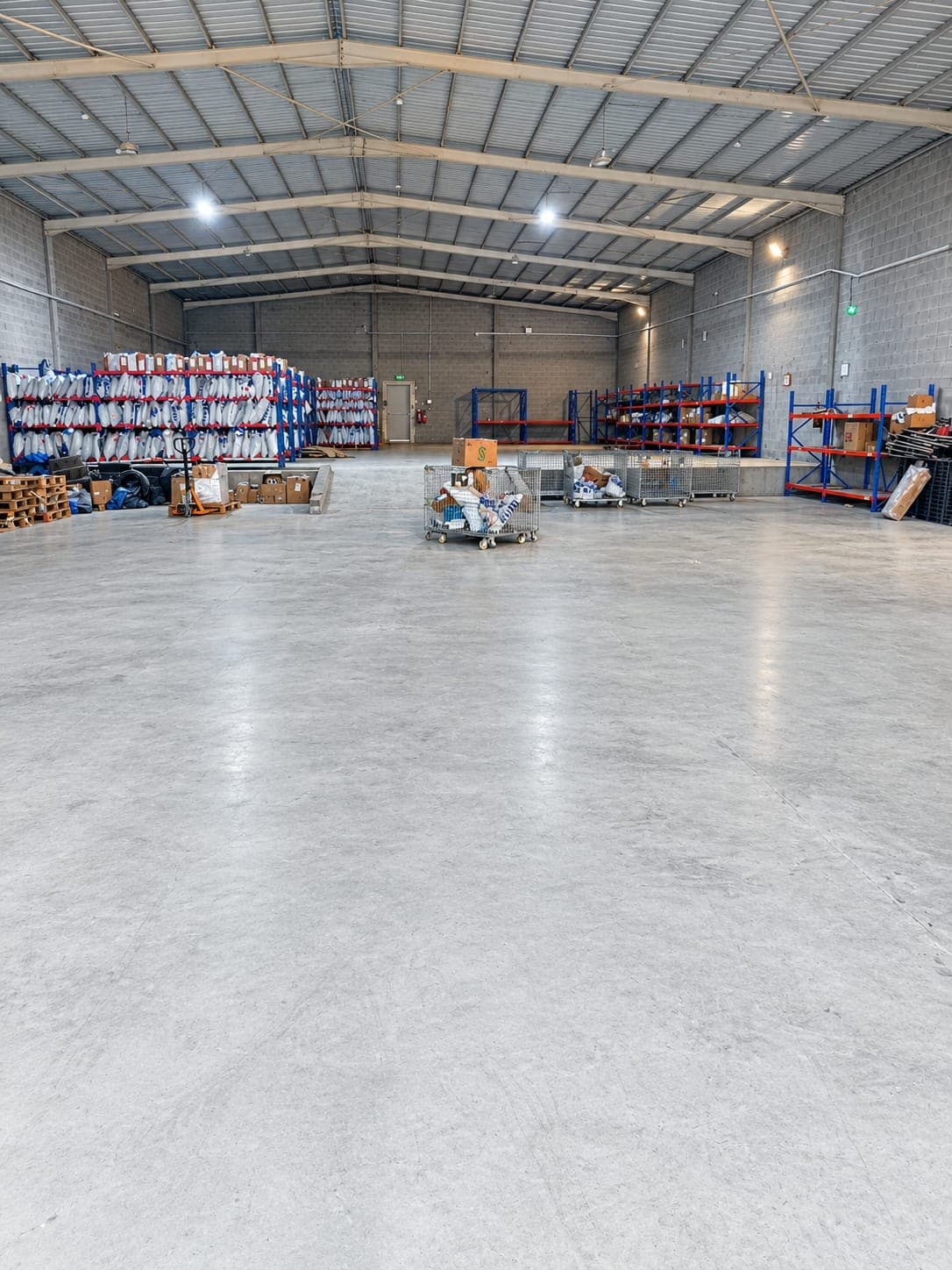 Inside the MSG Horizons Sabya hub: racks of parcels, sorting cages and an open floor