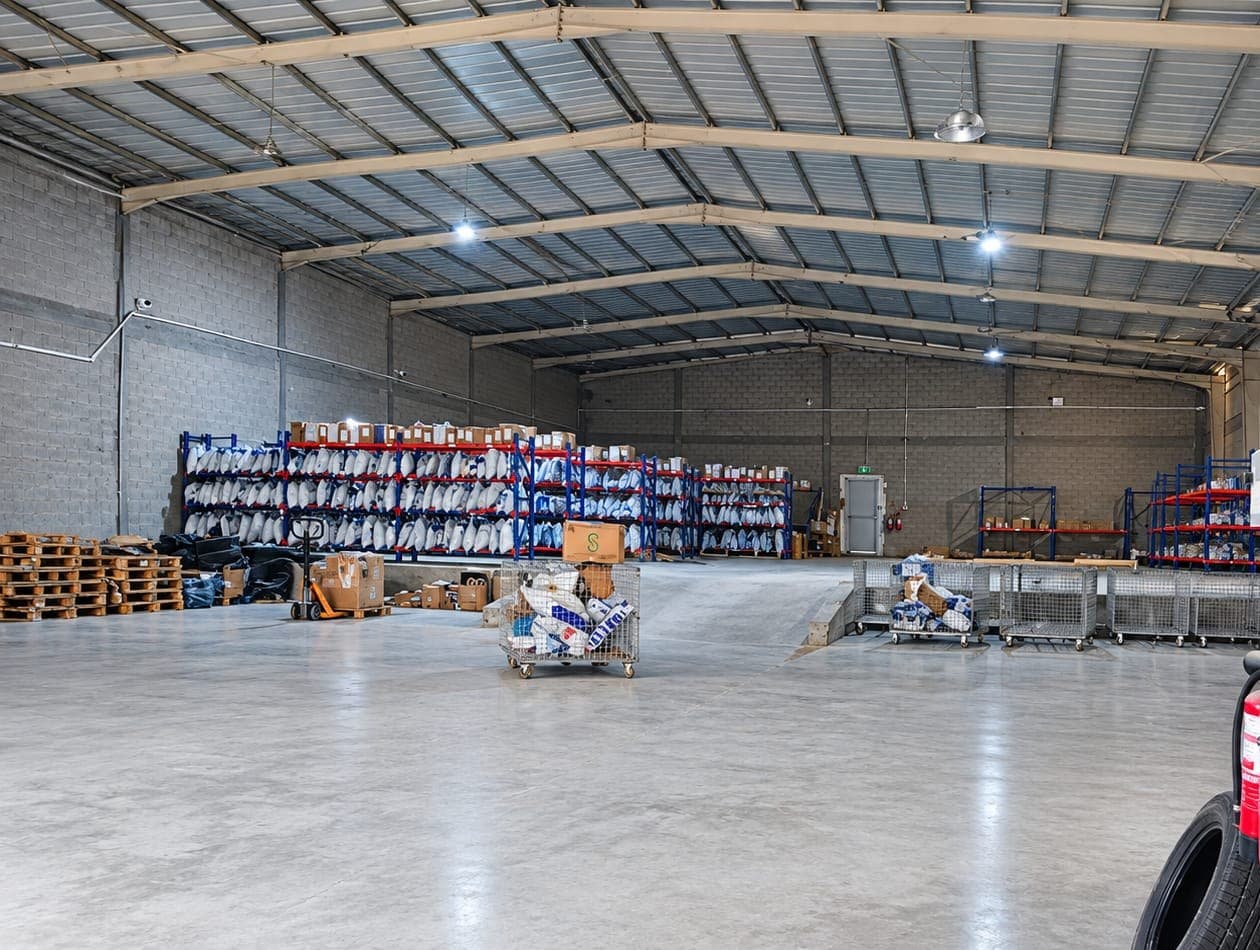 Inside the MSG Horizons Sabya hub: racks of parcels, sorting cages and an open floor